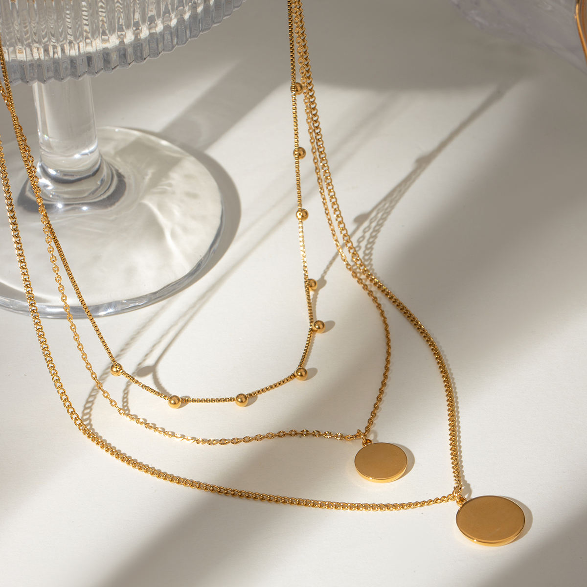 Layered Elegance - 18K Gold Plated Triple Layered Necklace with Disc & Bead Charm